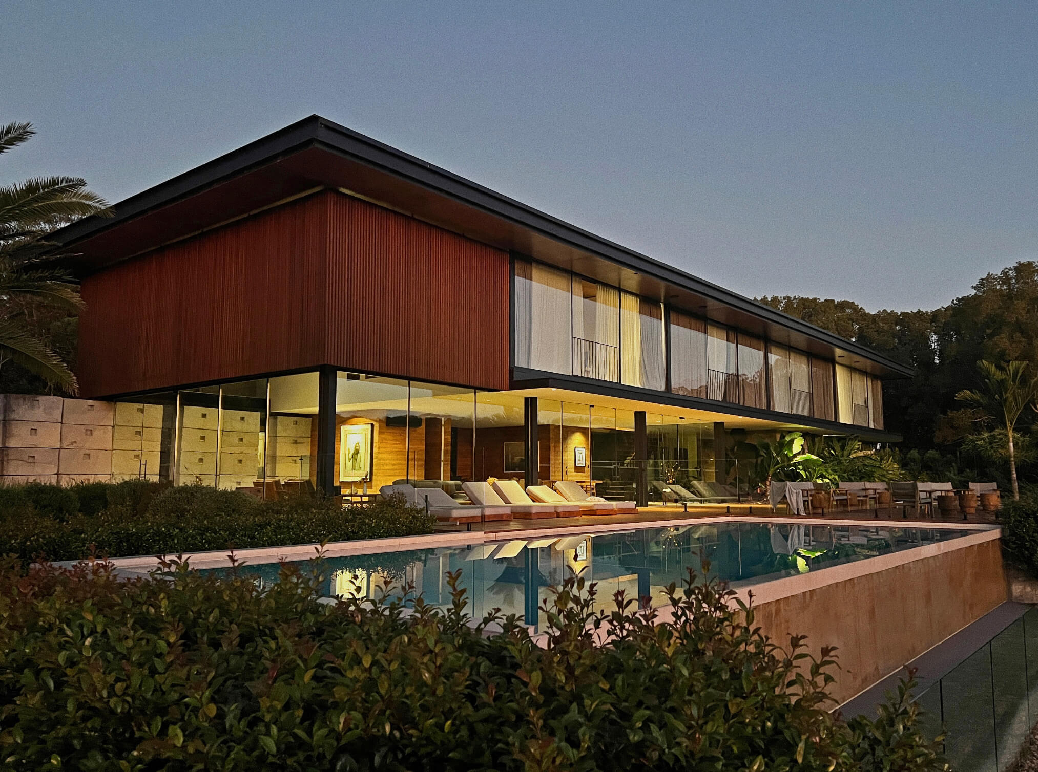 SOMA Residence & pool at dusk